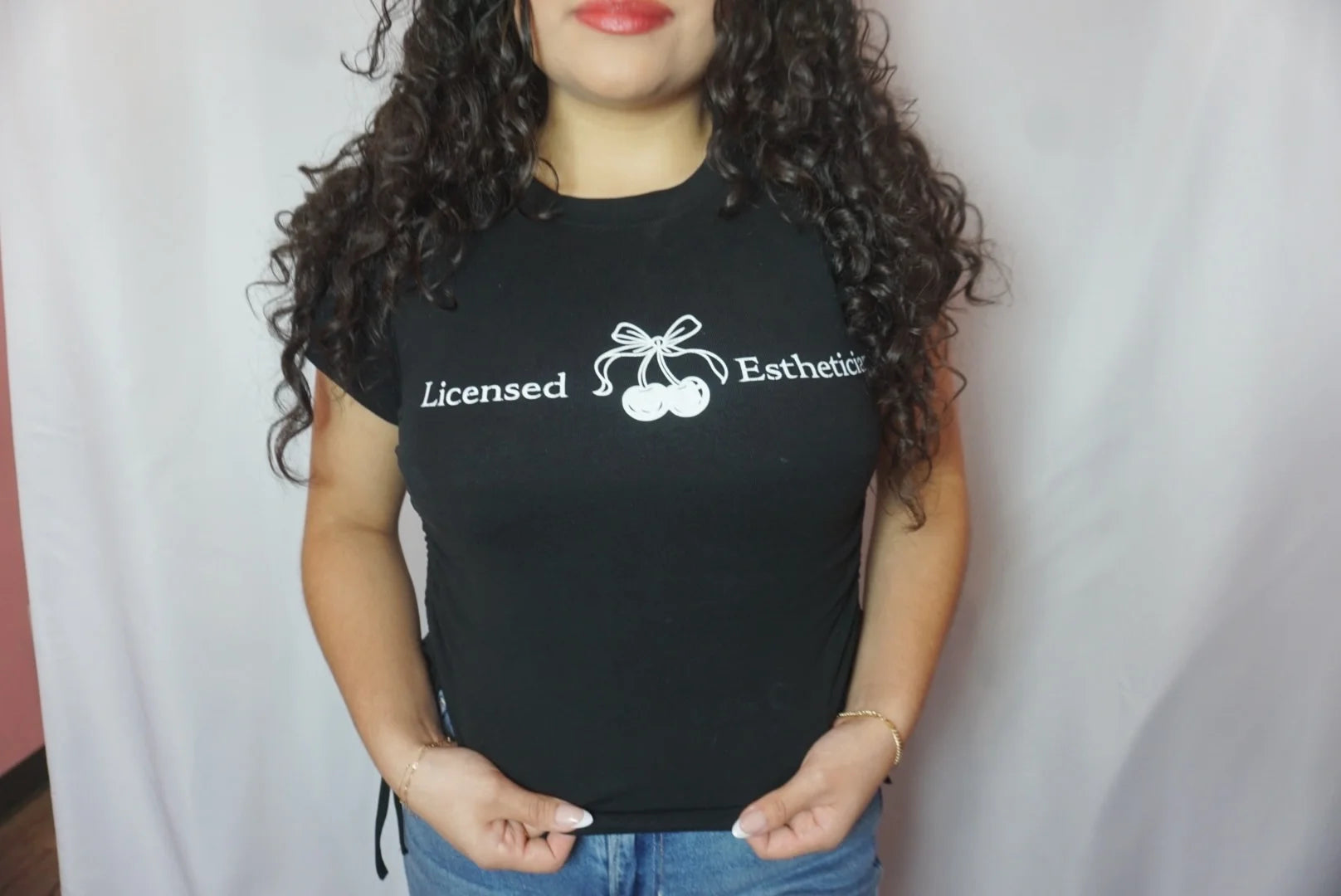 Licensed Esthetician” Draw String T - Shirt Black